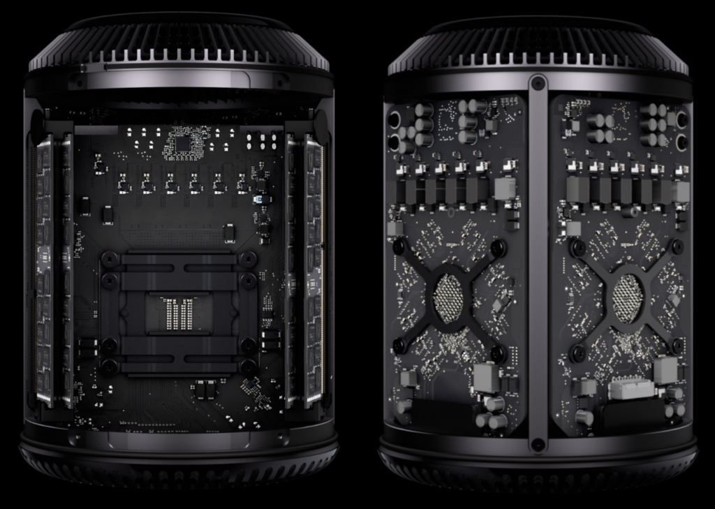 L'intérieur du nouveau Mac Pro : à gauche, la carte mère, à droite les deux cartes graphiques, en bas à droite le connecteur SSD